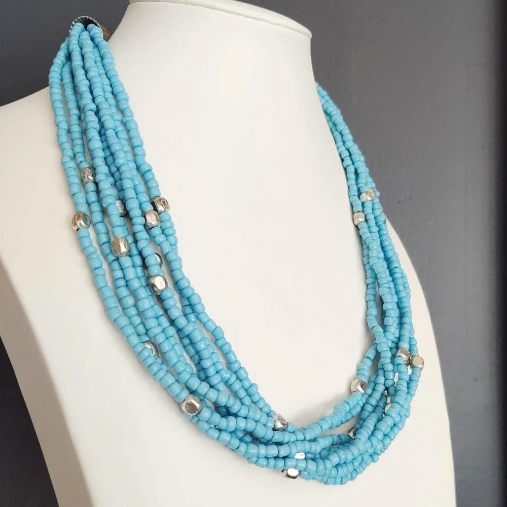 8 strand blue and silver beaded necklace